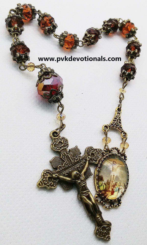 One Decade Rosary - Jesus Crucified Medal - 6x8mm Brown Glass Crystal