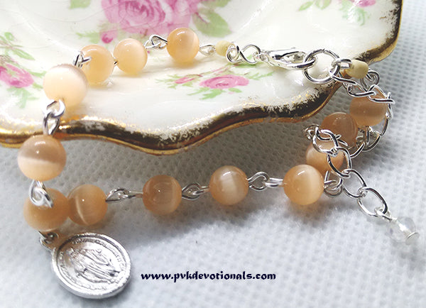 Religious Bracelet - Peach Cats Eye Beads with Miraculous Medal